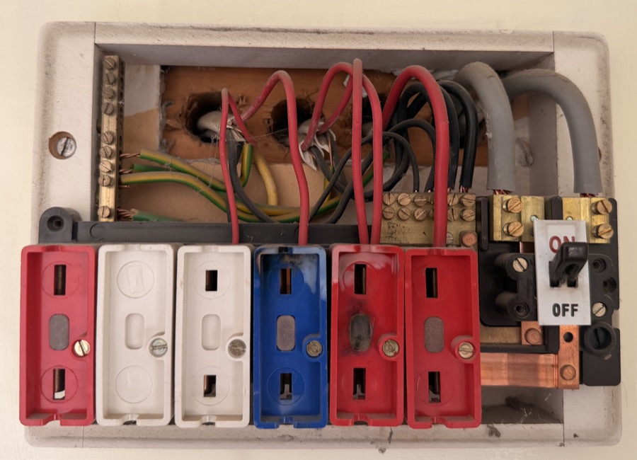 Old rewireable fuse box before consumer unit upgrade